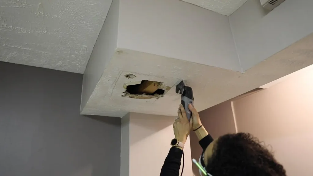 Assessing the damage and gathering supplies fixing a hole in your drywall ceiling